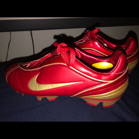 red and gold soccer cleats